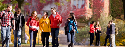 6 students walking on campus at u of guelph