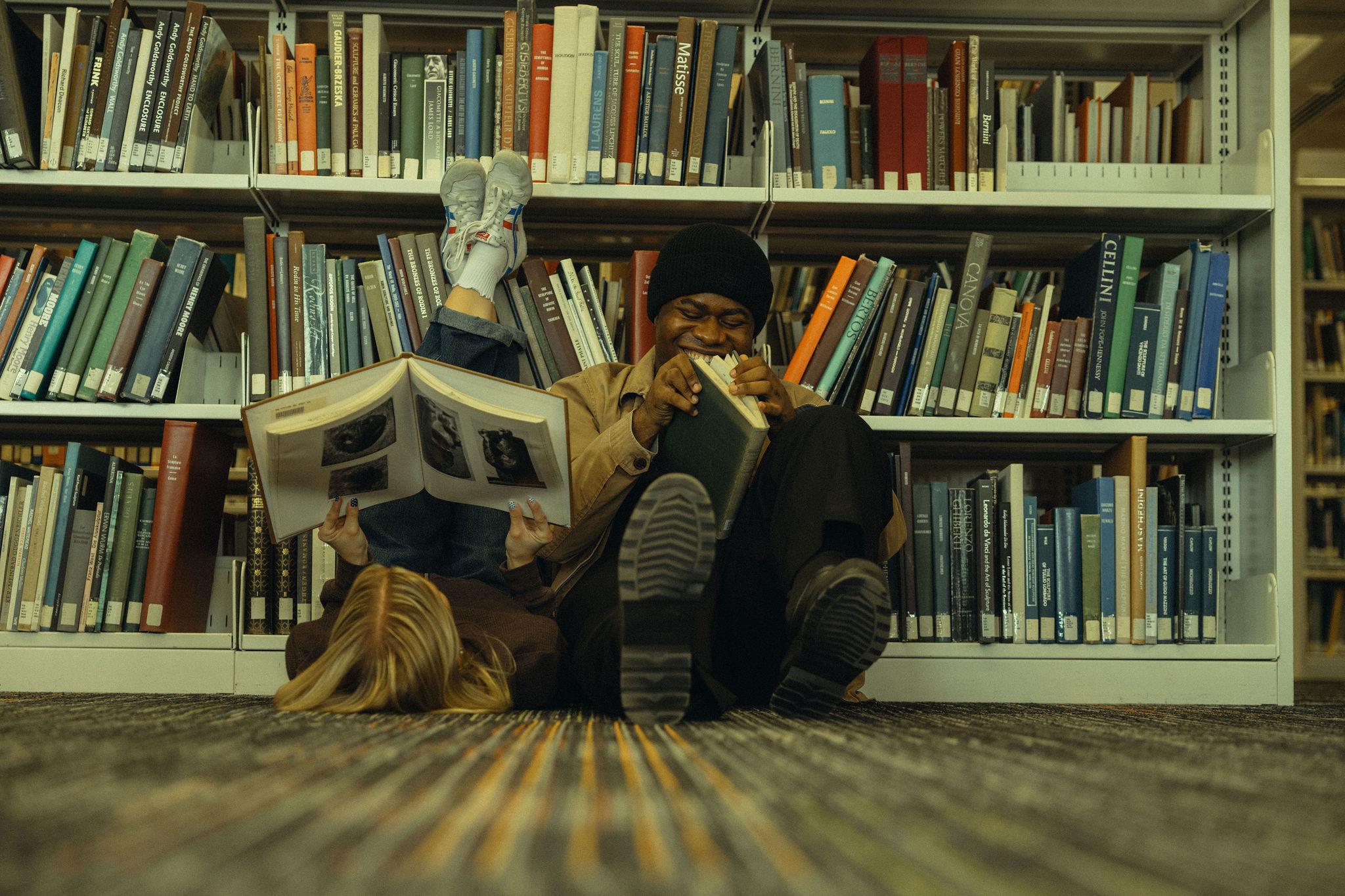 Students in the library reading