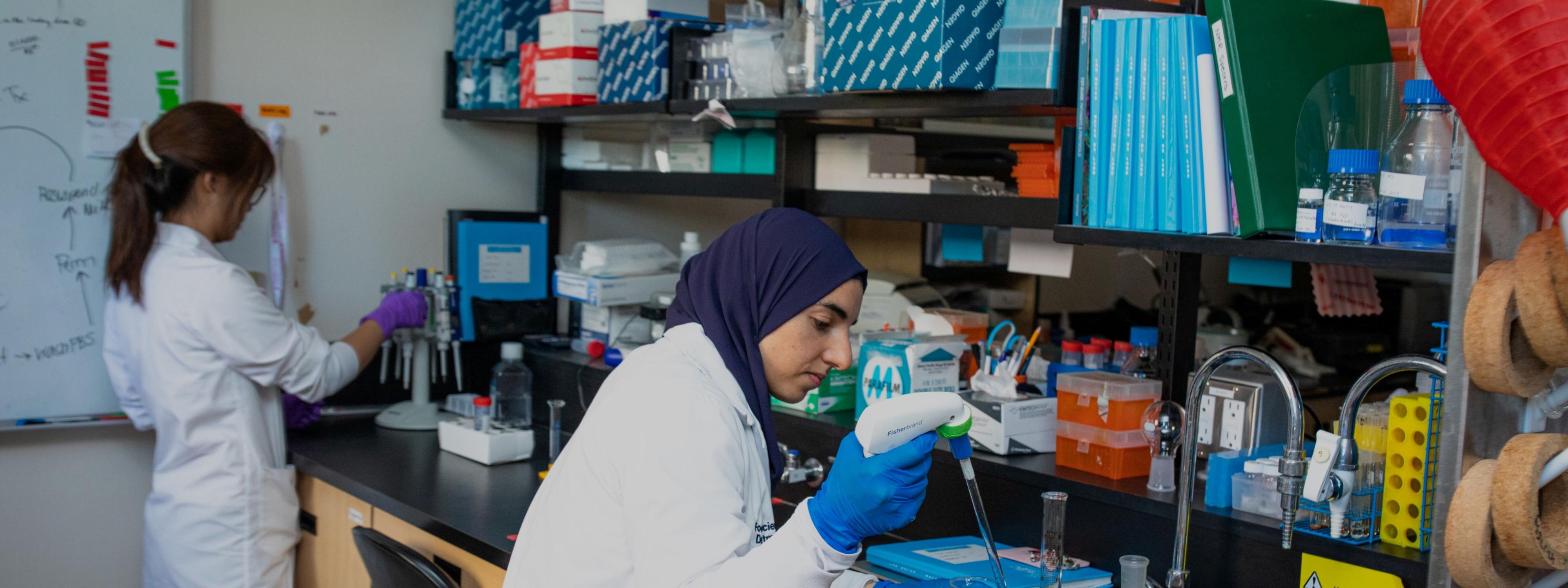 Two women in a lab at work