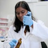 Karthika Sriskantharajah conducting research in a lab