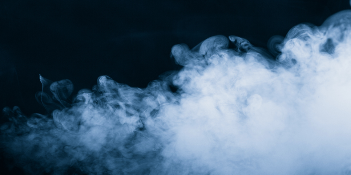 Photo of smoke against a dark background