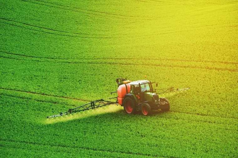 tractor spraying fertilizer
