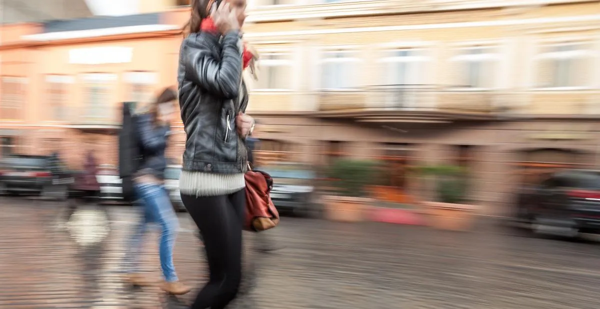 Blurry picture of woman walking