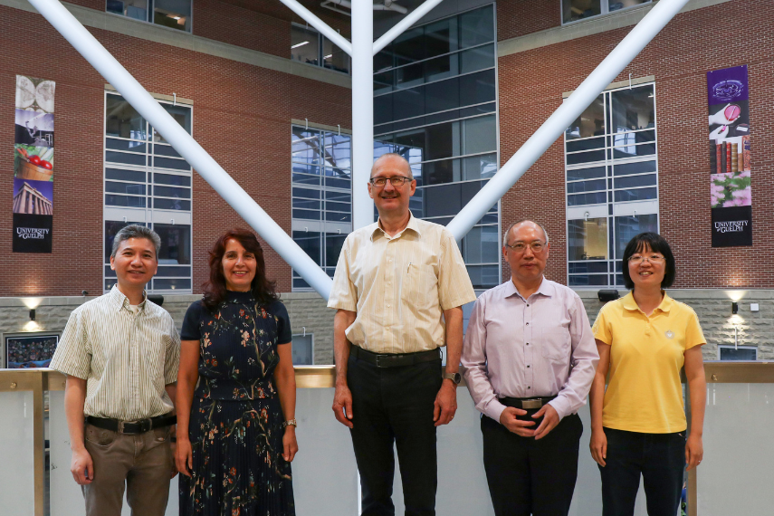 Photo of awards recipients standing side by side in Sumerlee Science Complex Atrium. Left to right: Dr. William Tam, Dr. Nagham Mohammad, Dr. Richard G. Zytner, Dr. Aicheng Che and Dr. Huiyan Li.