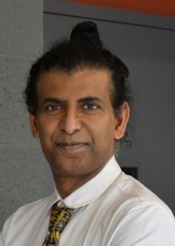 Headshot of Prof. Manick Annamalai