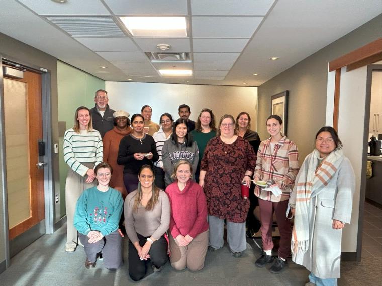 Faculty, staff, and students in the Department of Chemistry gather together.