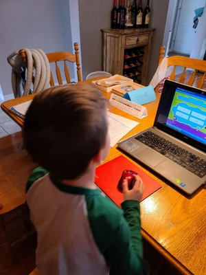 Image of a child doing homework at home