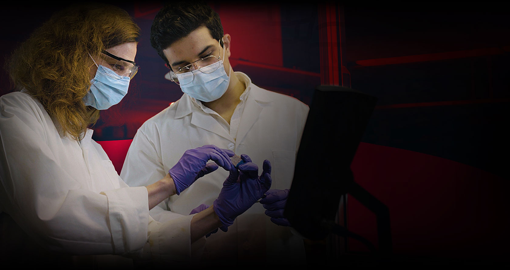 Abdullah and Karen working in a lab