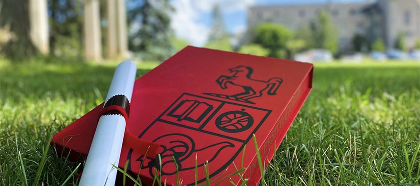 convocation keepsake boxes in the grass on Johnston Green